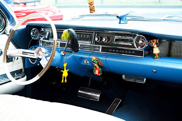 Dashboard and steering wheel - interior of luxury full-size classic american automobile -  Cadillac De Ville Convertible 1968 (third generation 1965-1970) - Palic, Serbia, 30.06.2024