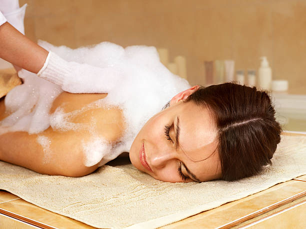 Massage of woman in beauty spa. stock photo