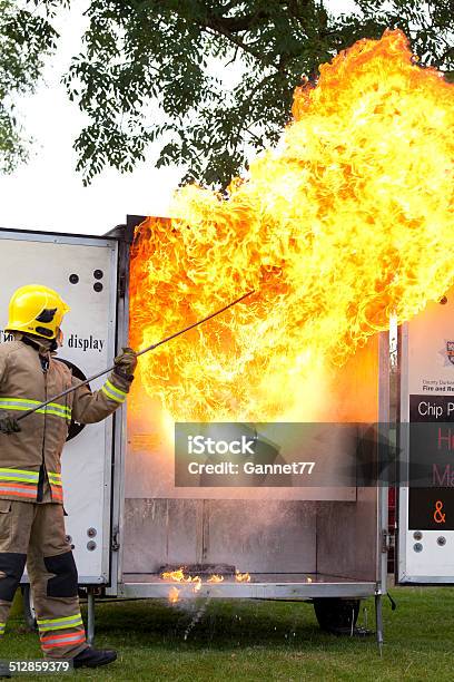 Demonstration Of Pouring Water On Burning Oil Stock Photo - Download Image Now - Burning, Chip Pan, Cooking Oil