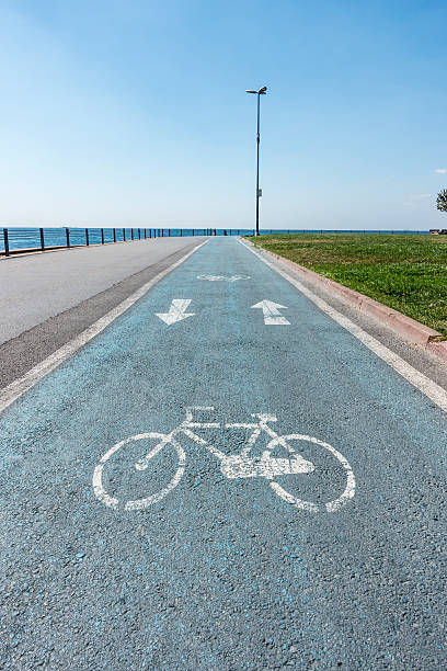 istock bike lane in the park 512860041