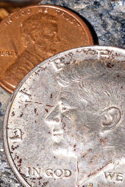 istock Half dollar coin with John F Kennedy and penny 512860185
