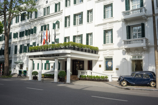 Ha Noi, Viet Nam - September 7, 2014: Front view of Hotel Sofitel Legend Metropole Hanoi. The old hotel is a well-known French architecture in Vietnam.