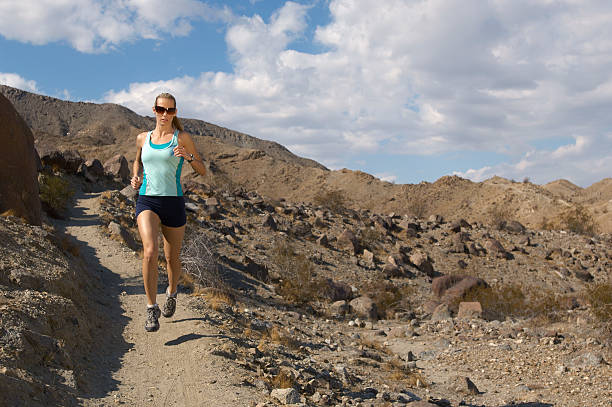 istock Woman exercising outdoors 512861473