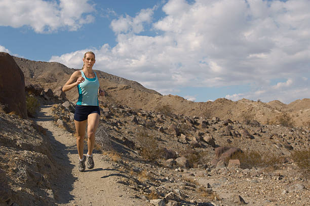 istock Woman exercising outdoors 512861475
