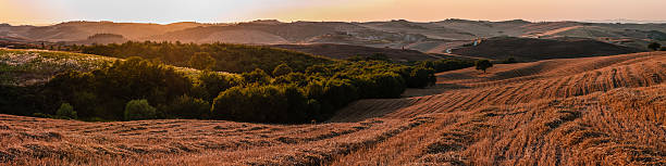 Romantic Large scale panorama in Tuscany Italy at sunset stock photo