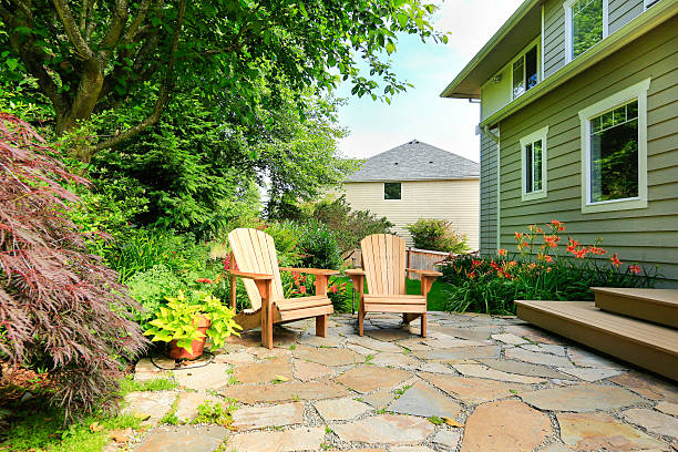 istock Outdoor rest area. Backyard with wooden chairs 512864579