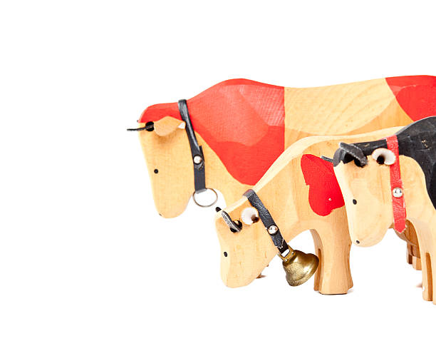 istock wood cow toy 512865069