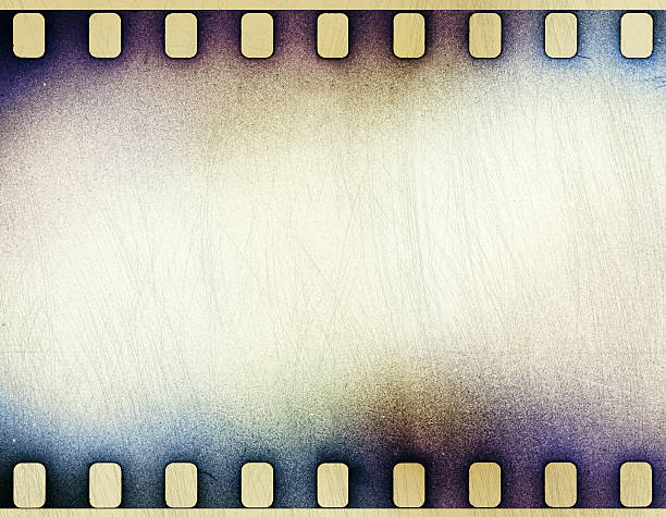 istock grunge scratched film strip background 512866473