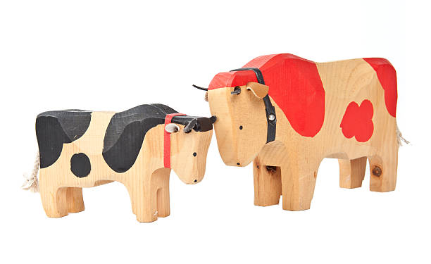 istock wood cow toy 512866733