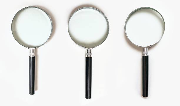 istock Set of magnifying glasses with shadow isolated on white background 512883150