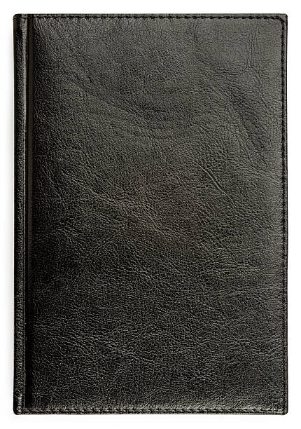 istock Closeup of texture leather notebook with stitching along edge 512884724