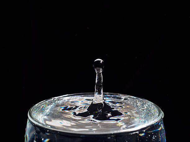istock red water drop on the glass 512886998