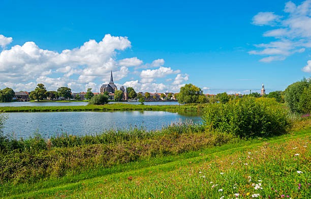 Skyline of an ancient city along a river Skyline of an ancient city along a river ijssel photos stock pictures, royalty-free photos & images