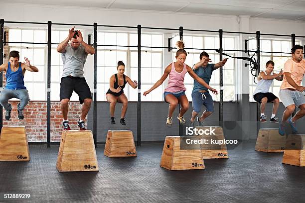 Getting The Jump On Fitness Stock Photo - Download Image Now - Jumping, Exercise Class, Group Of People