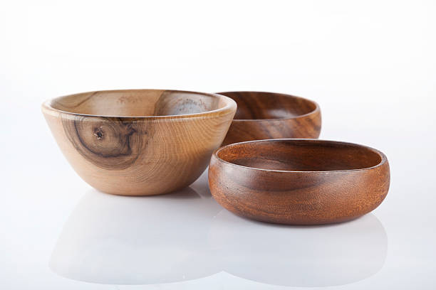 istock Wooden plates on white background 512889743