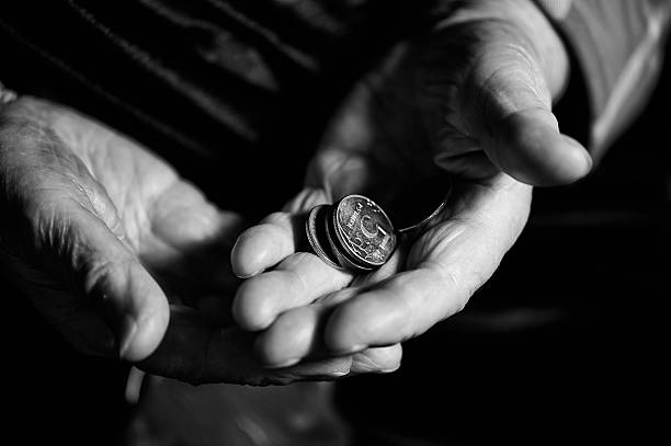 istock Hands of an man counting money 512890104