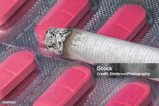 Cigarette Vs Pills Stock Photo - Download Image Now - Antibiotic, Box - Container, Capsule - Medicine