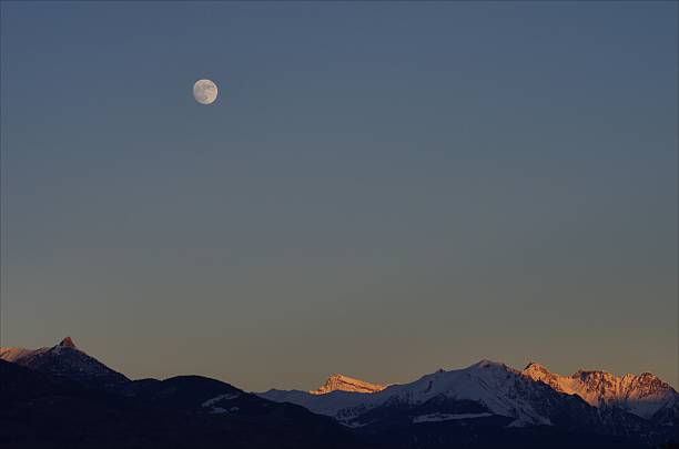istock Moon above the Italian Alps 512892335