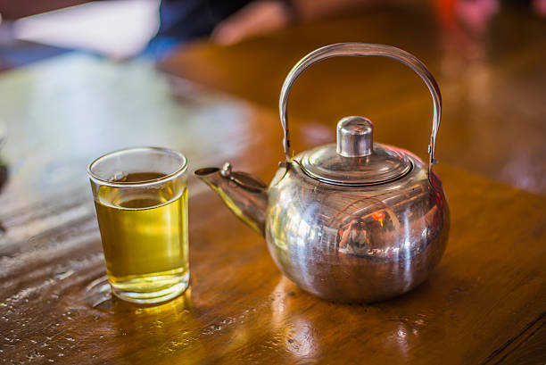 istock Cup of tea and teapot stainless 512892656
