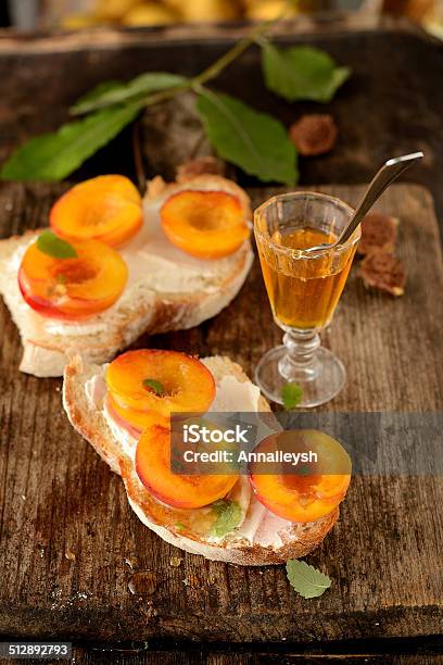 Open Sandwiches With Peach And Honey Stock Photo - Download Image Now - Appetizer, Baguette, Basil