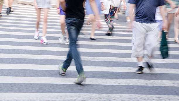 istock People walking on big city street 512893643