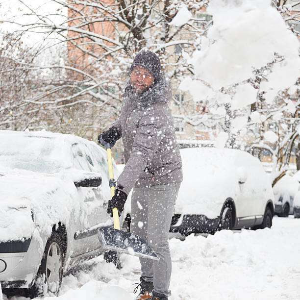 istock Man shoveling snow in winter. 512894888