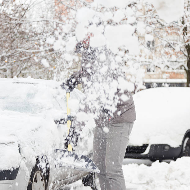 istock Man shoveling snow in winter. 512894924