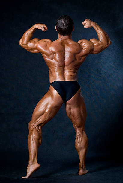 istock Young athletic man in a full-length 512898704