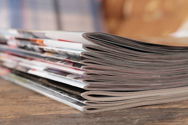 istock Magazines on the wooden table 512899276