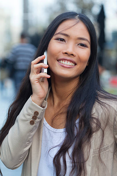 istock Woman with cellphone 512903282
