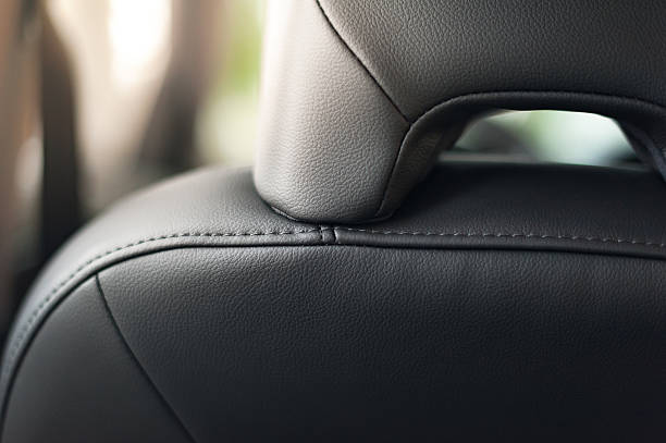 istock Leather car seats  detail with focus on stitch 512904624