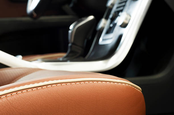 istock Leather car seats  detail with focus on stitch 512904654