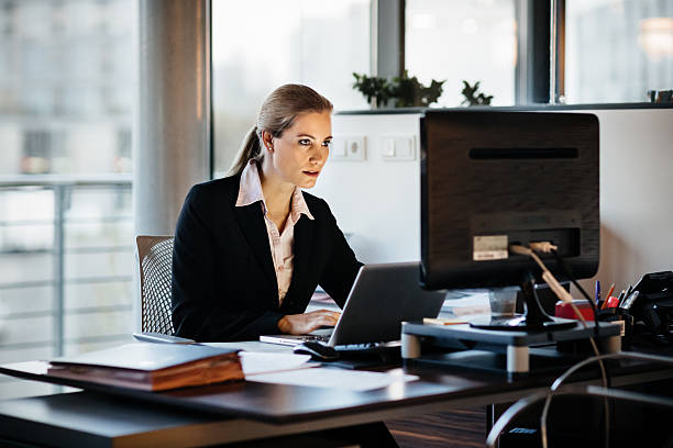 istock Young Business Woman Working Late 512904872
