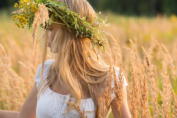istock young woman in wreath 512910122