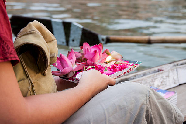 Gift for the dead people in Ganga River. Varanasi. India. stock photo