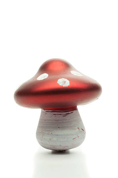 istock Christmas decoration, glass mushroom isolated on white background 512917757