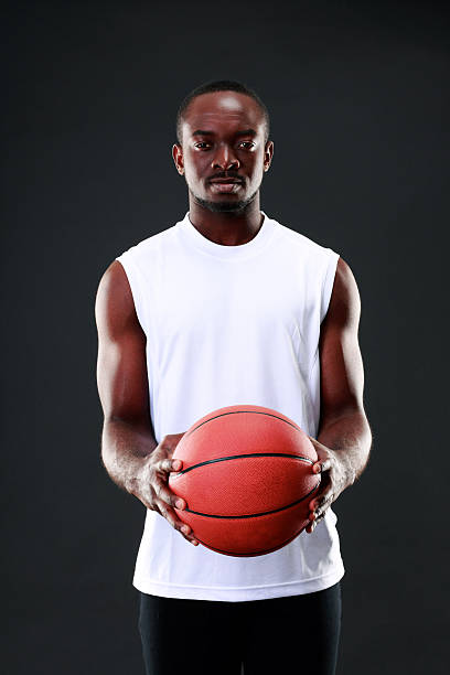 istock african american holding  basketball ball 512918193
