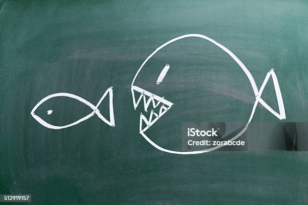 Big Fish Eats Small One Stock Photo - Download Image Now - Large, Small, Fish