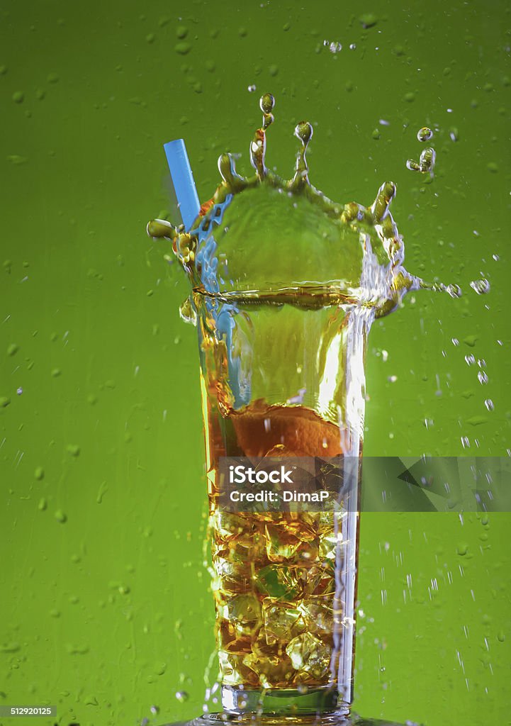 Splashed Ice Tea Ice Tea Splash Stock Photo - Download Image Now - Brown, Cocktail, Cold ...