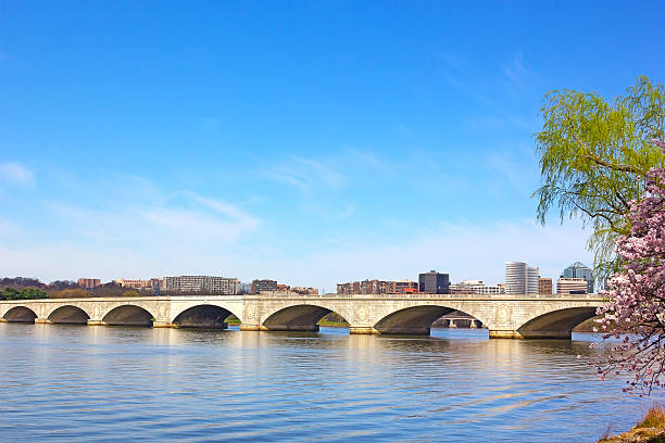 istock Arlington memorial Bridge during cherry blossom in Washington DC. 512921683
