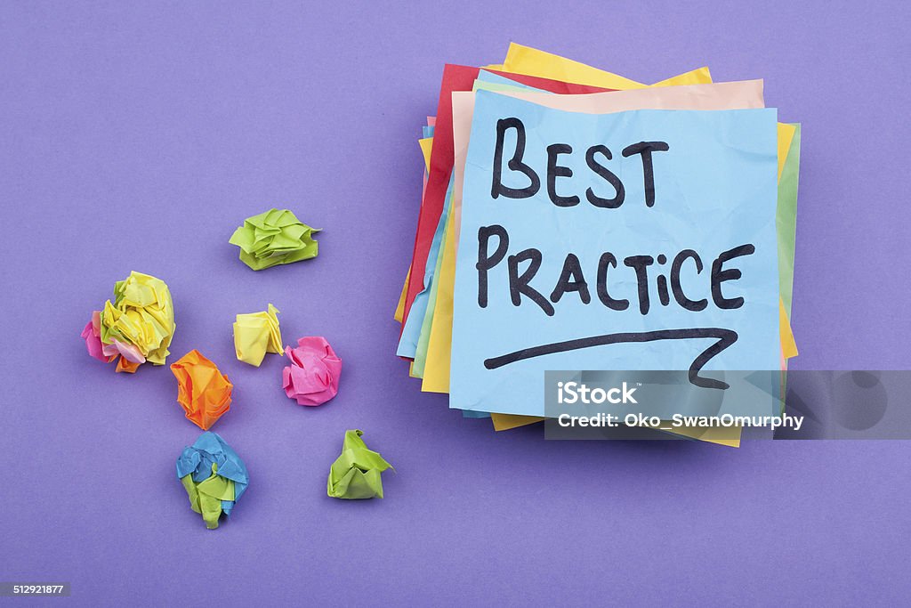 Best Practice Best Practice note on colorful adhesive notes' stack Adhesive Note Stock Photo