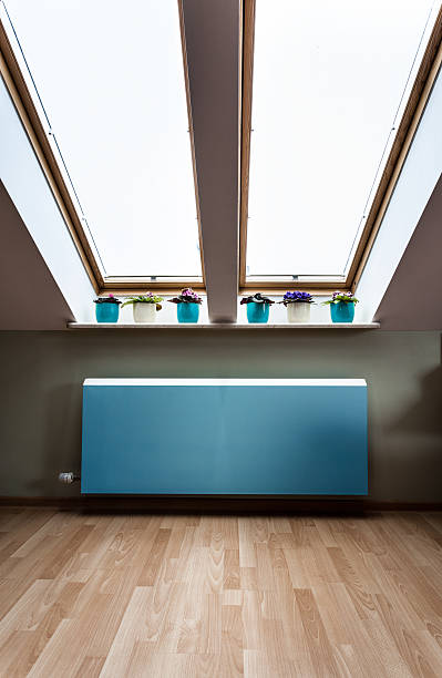 istock Modern radiator in the attic 512921905