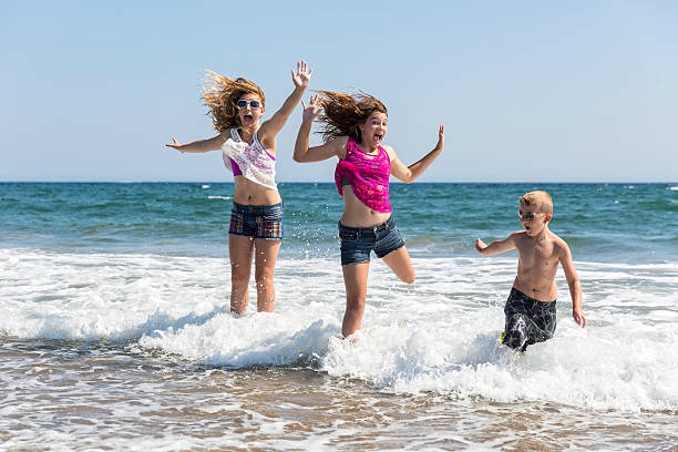istock Brother and Sisters Express that the Water is Cold 512922459