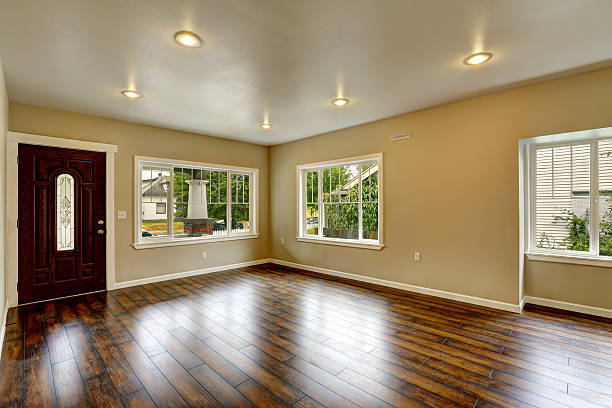 istock Empty house interior. Spacious living room with new hardwood flo 512923075