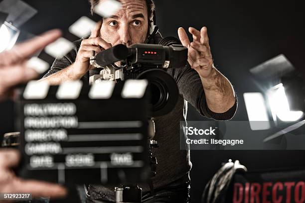 Cameraman On Set Stock Photo - Download Image Now - Movie, Director, Film Slate