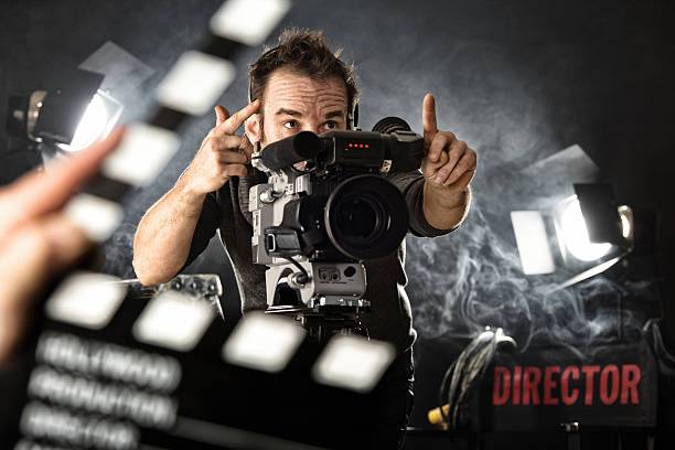 Cameraman on set Cameraman on set film crew stock pictures, royalty-free photos & images