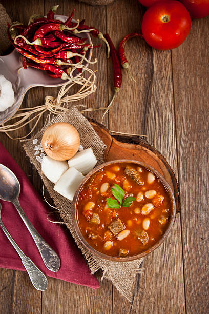 istock Hot turkish bean stew with a tasty tomato sauce. 512924135