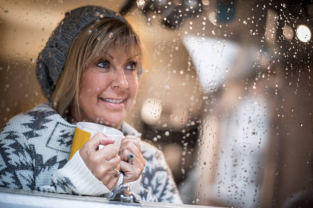 istock Winter woman drinking coffee 512924201