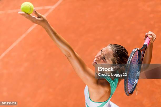 Young Woman Playing Tennis Stock Photo - Download Image Now - Activity, Adult, Adults Only