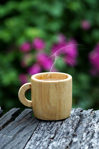 istock morning coffee with wood cup. 512937063